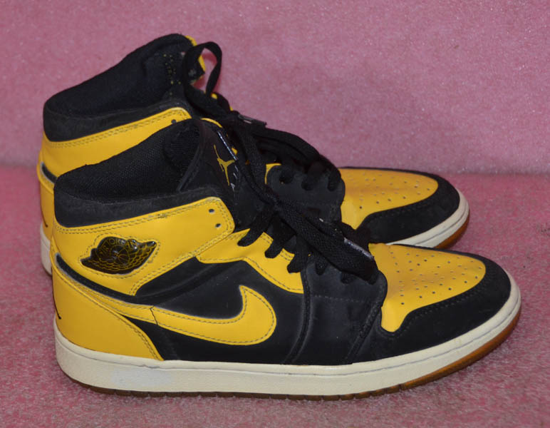 black and yellow shoes nike